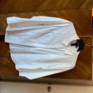 White blouse with heeled collar